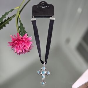 Elegant Silver and Blue Cross Pendant Necklace